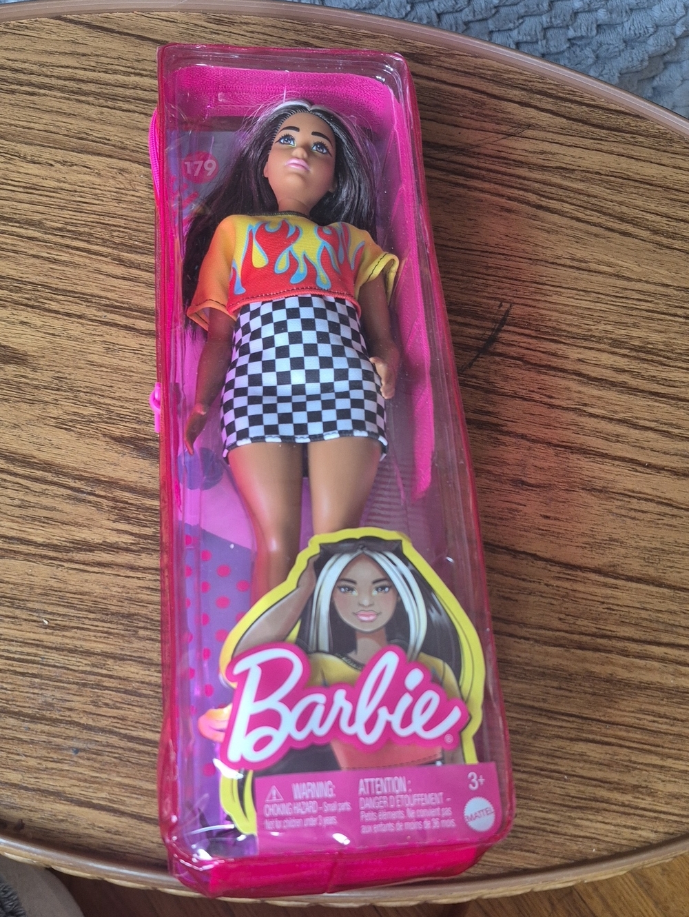 Mattel Barbie Doll in Yellow Flame Top with Black-and-White Check Skirt